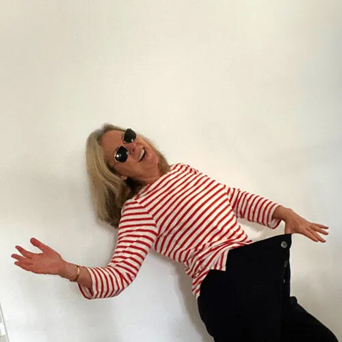 woman wearing scary elastic pants and a stripped shirt