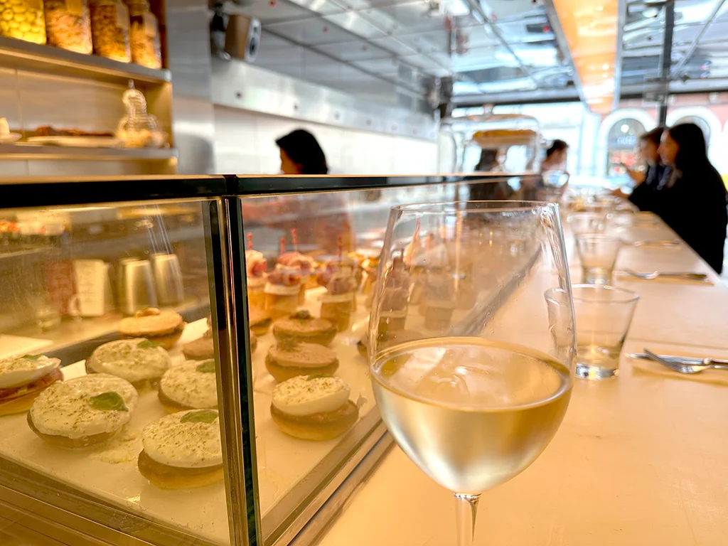 Glass of wine and tapas, dinner in Lisbon