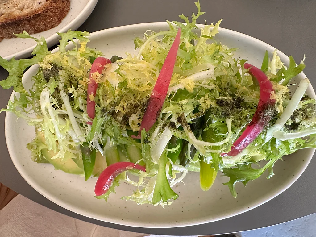 Green eggs, avocado, asparagus and lettuce on top