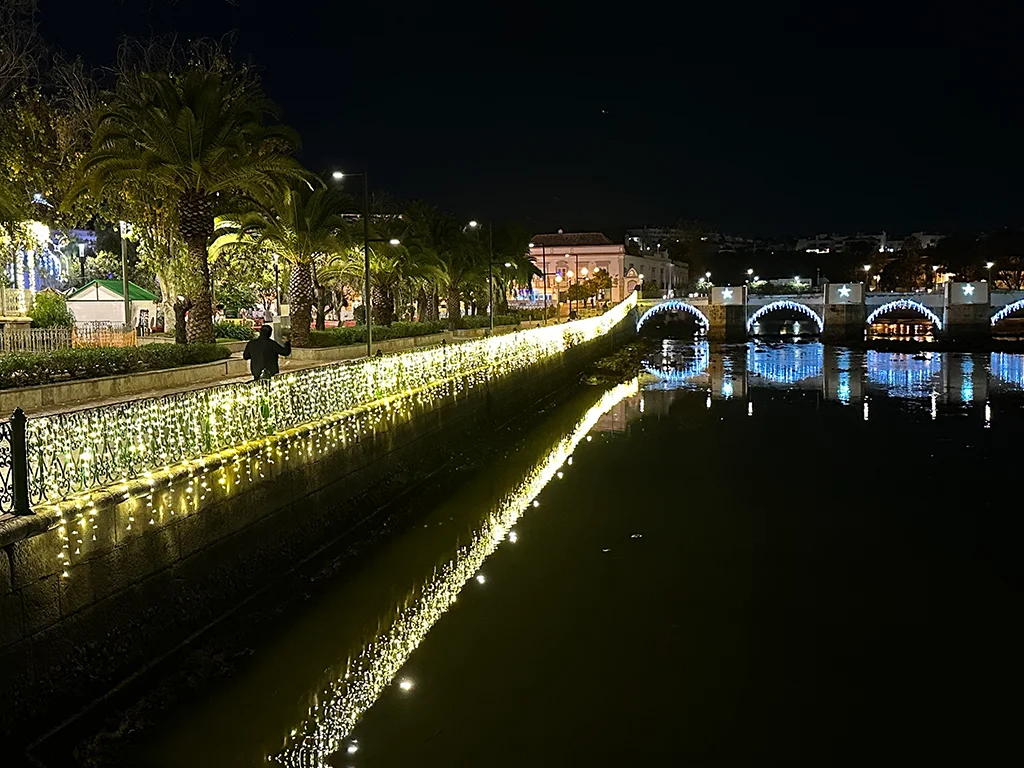 The river front in Tavira at night with lights